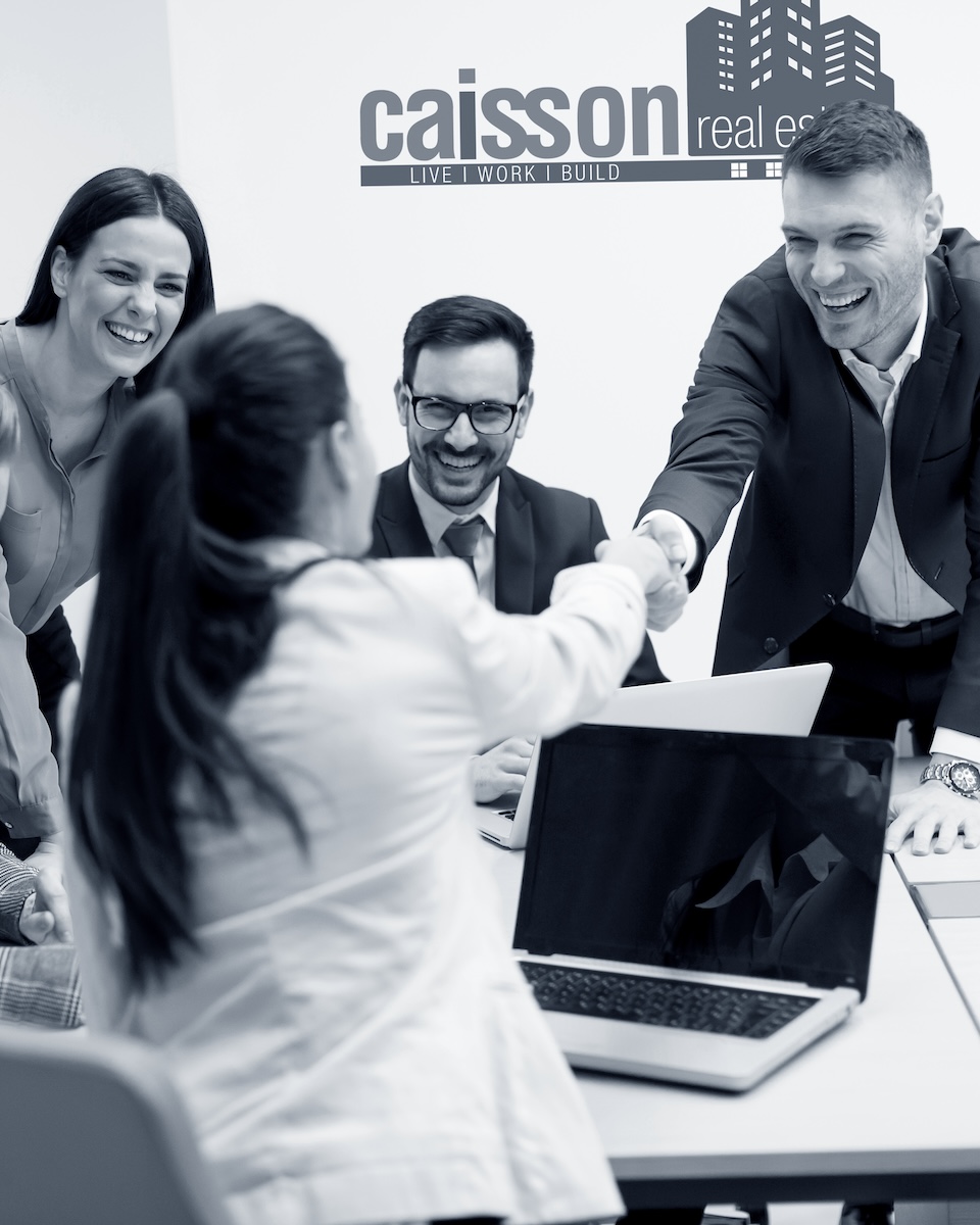 Business partners analyze the business results in modern office View at business partners analyze the business results in modern office